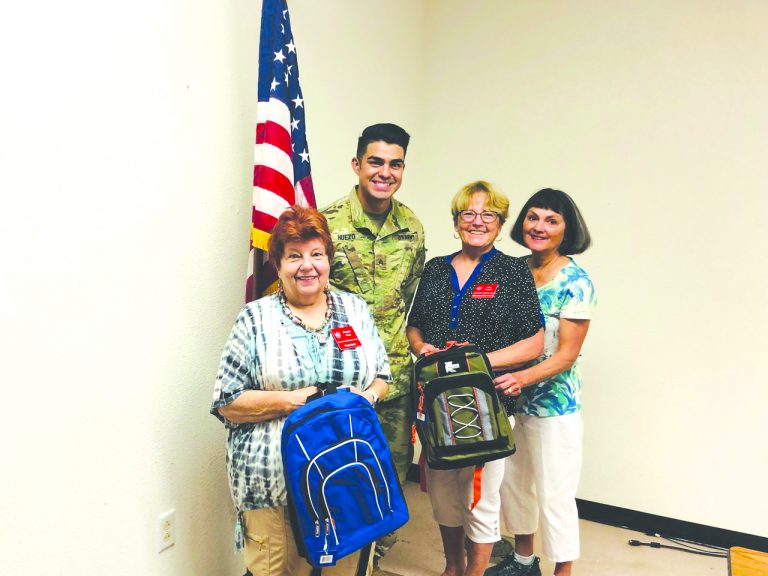 Rossmoor Woman’s Club donates backpacks to students of JFTB military personnel