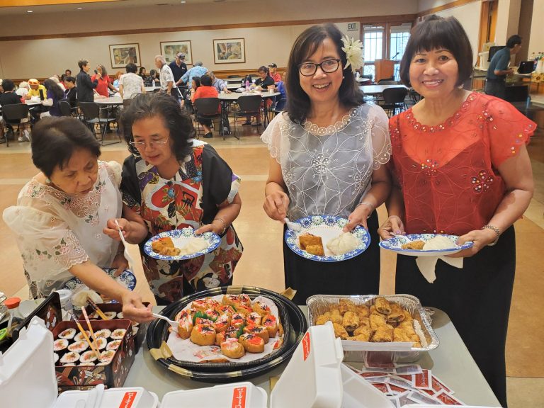 Da’ Hawaii seniors enjoy global potluck and dancing