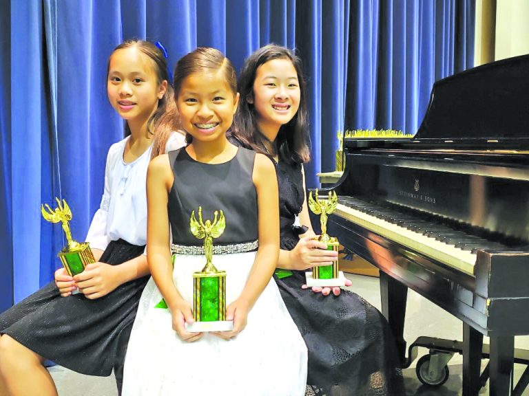 McAuliffe, Oak students test musical skills at music festival