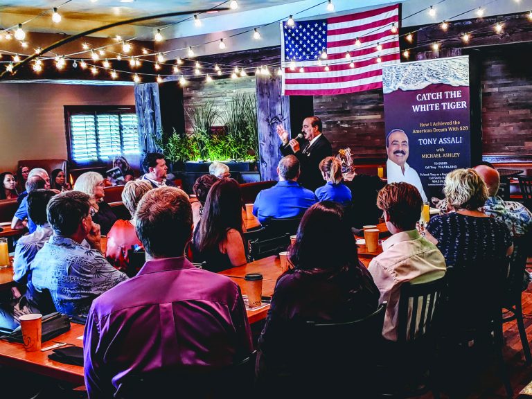 Tony Assali urges Chamber members to find a white tiger