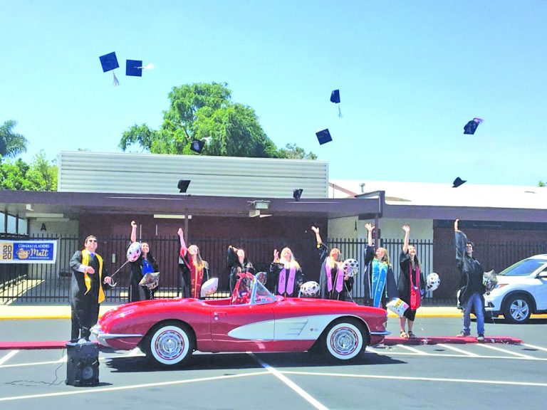 Kindergarten students stage their college graduation ceremony together