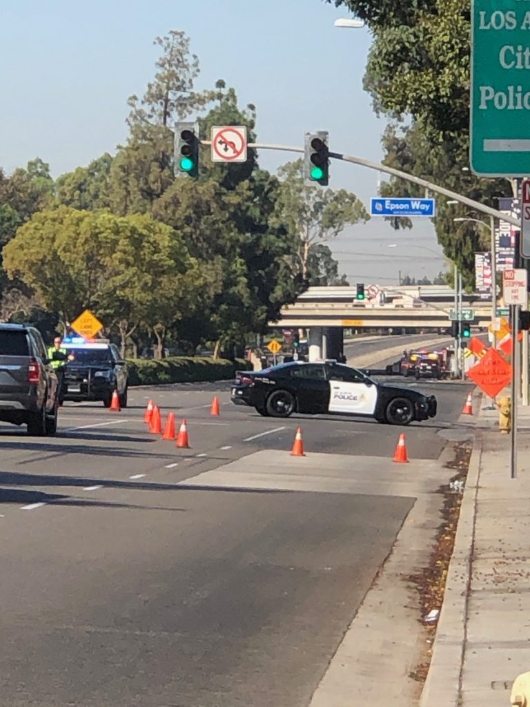 Transient apparently opens fire on officer, CalTrans. Shuts down Katella