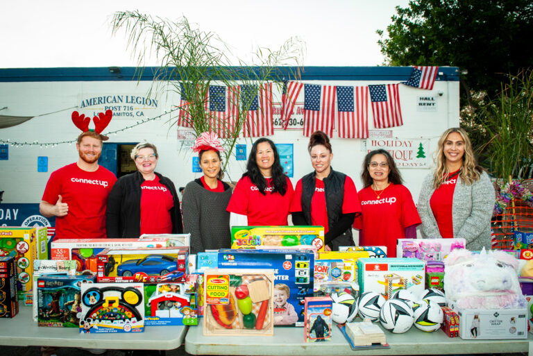 Raytheon distributes toys, gift cards to military families in Los Alamitos