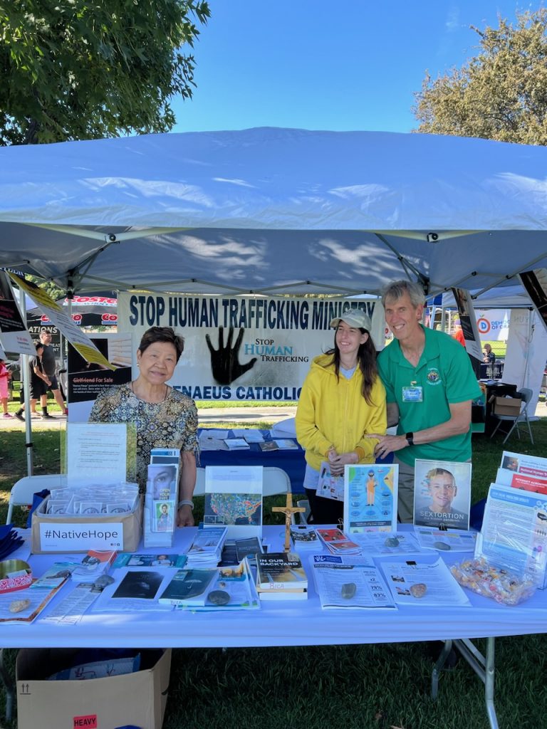 St. Irenaeus booth at “Stop Human Trafficking” event