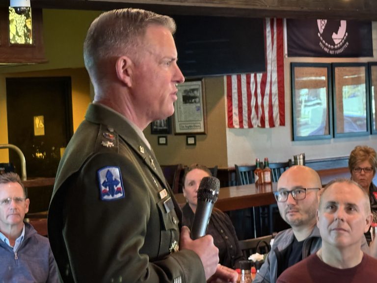 Lt. Col. Fox explains miltary complexity of base to Chamber members at March meeting