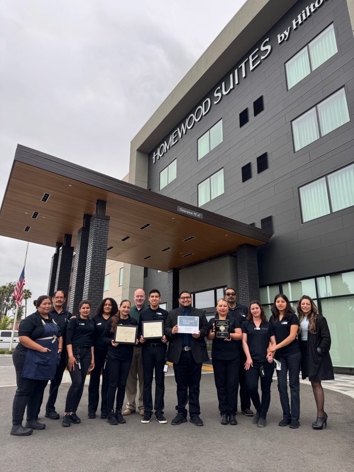 The staff at the Homewood Suites in Cypress celebrate their recognition. Courtesy photo