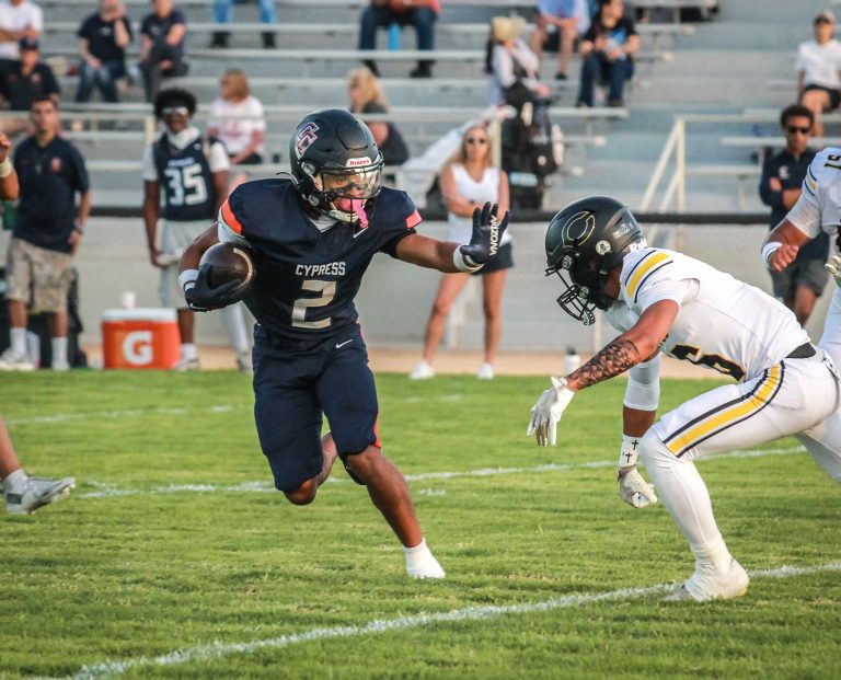Cypress rolls to win in season opener