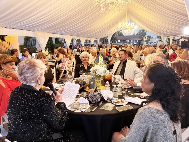 Supporters gather to celebrate Los Al’s ‘Miracle on Reagan Street’ as St. Isidore turns 100
